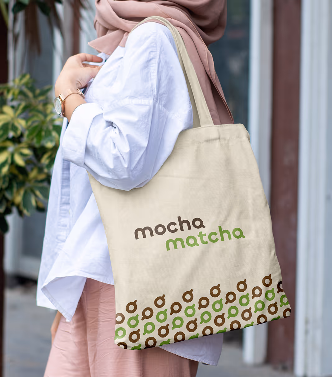 An image of a person carrying a Mocha Matcha tote bag as merchandise for the brand
