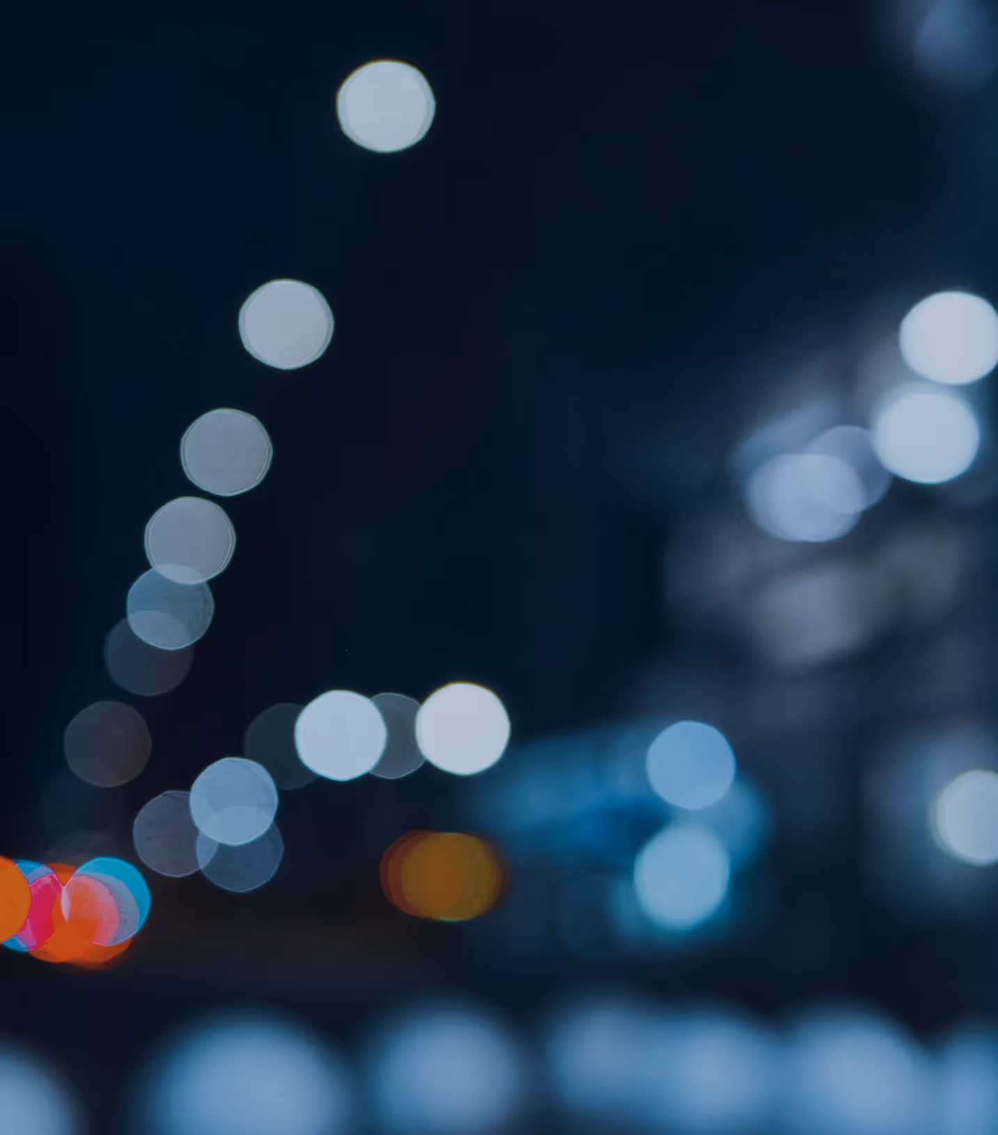 An image of the bokeh effect in the city night, from Wasis Riyan on Unsplash