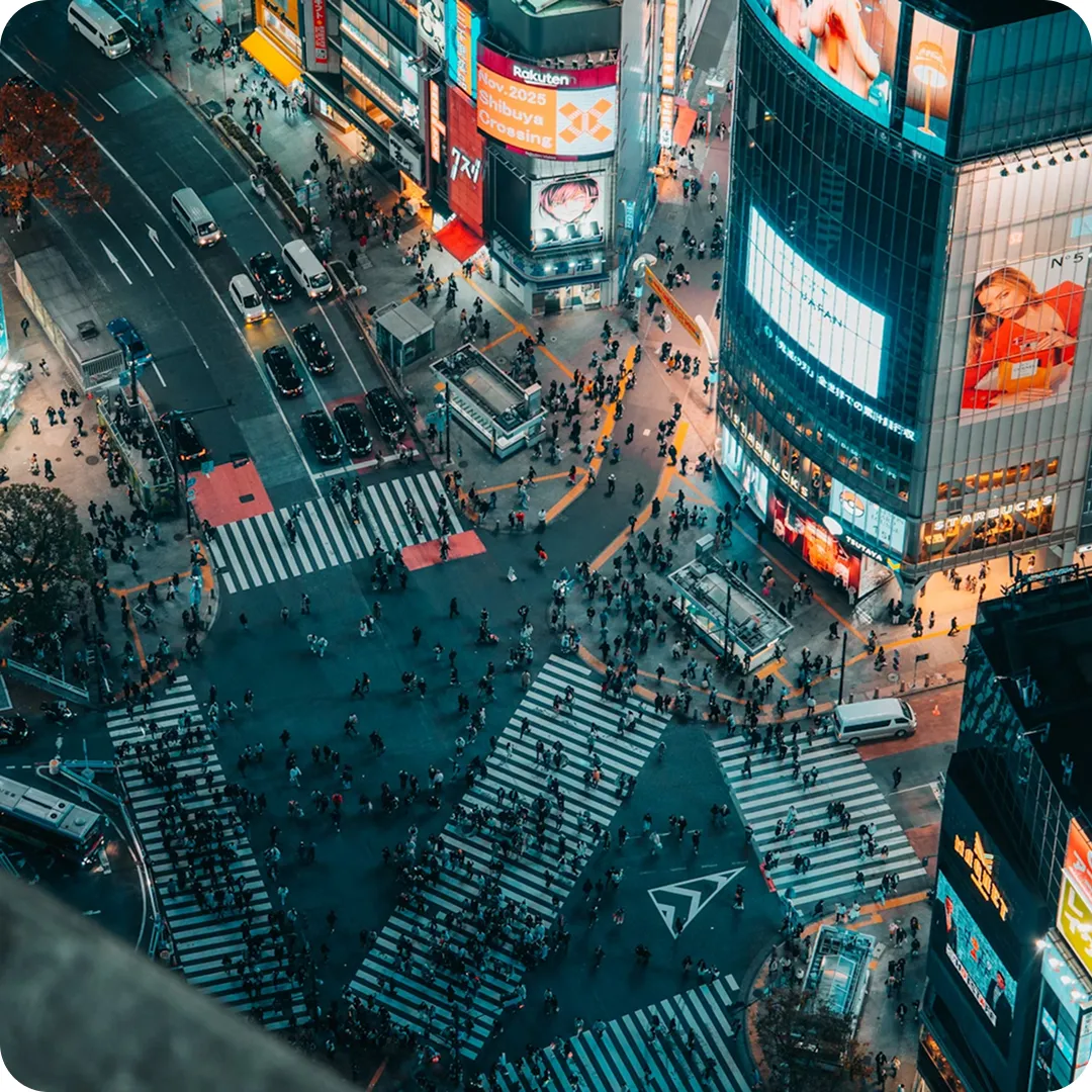 Aerial view of busy urban crossing at night