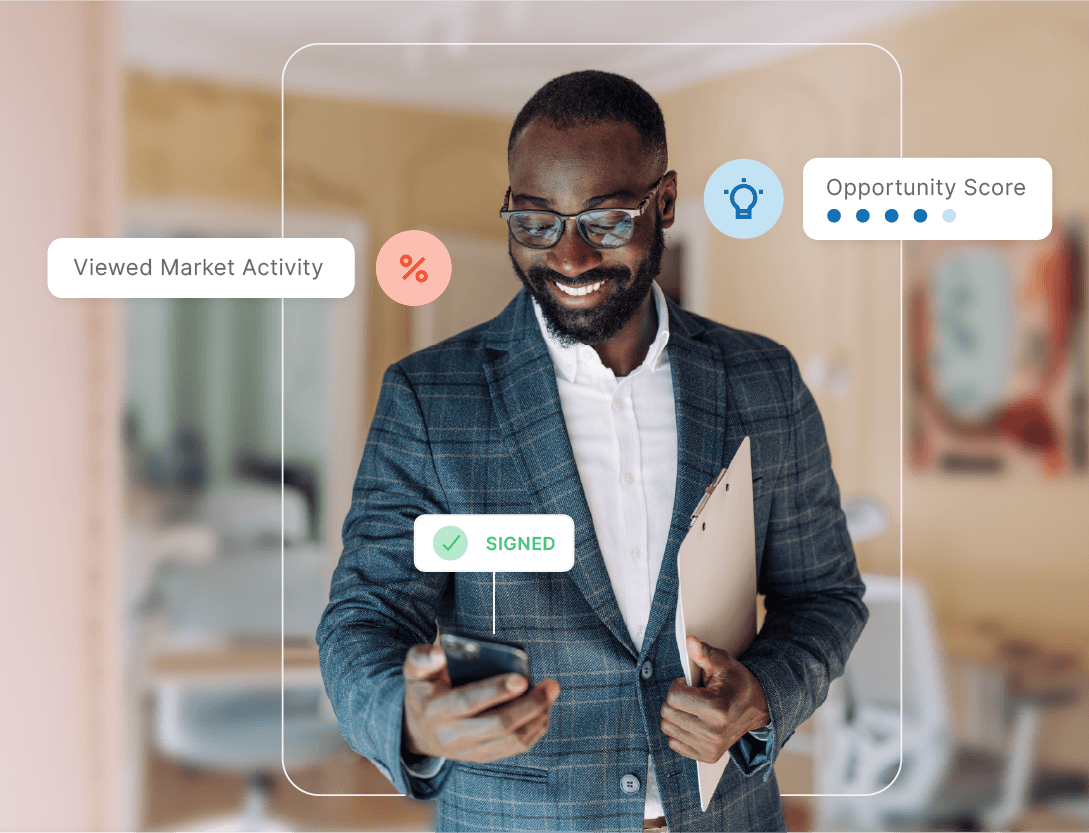 Real estate agent reviewing inHere prospecting dashboard with a Signed notification.