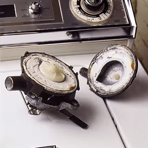 Limescale buildup on a washing-machine pump