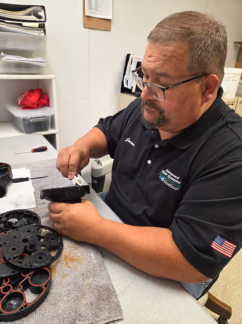 Water treatment technician meeting with customers