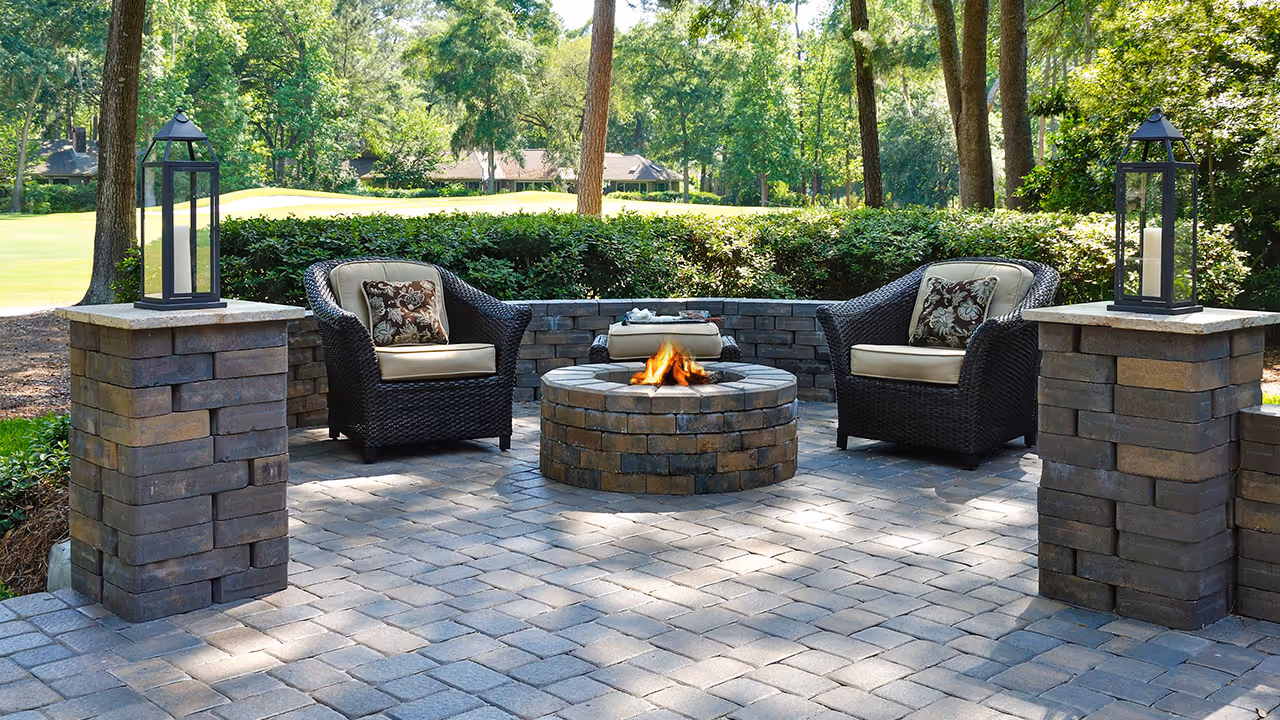 Outdoor living hardscaping area with patio and walkway by Executive Lawn Care & Landscaping in Bloomington, Indiana