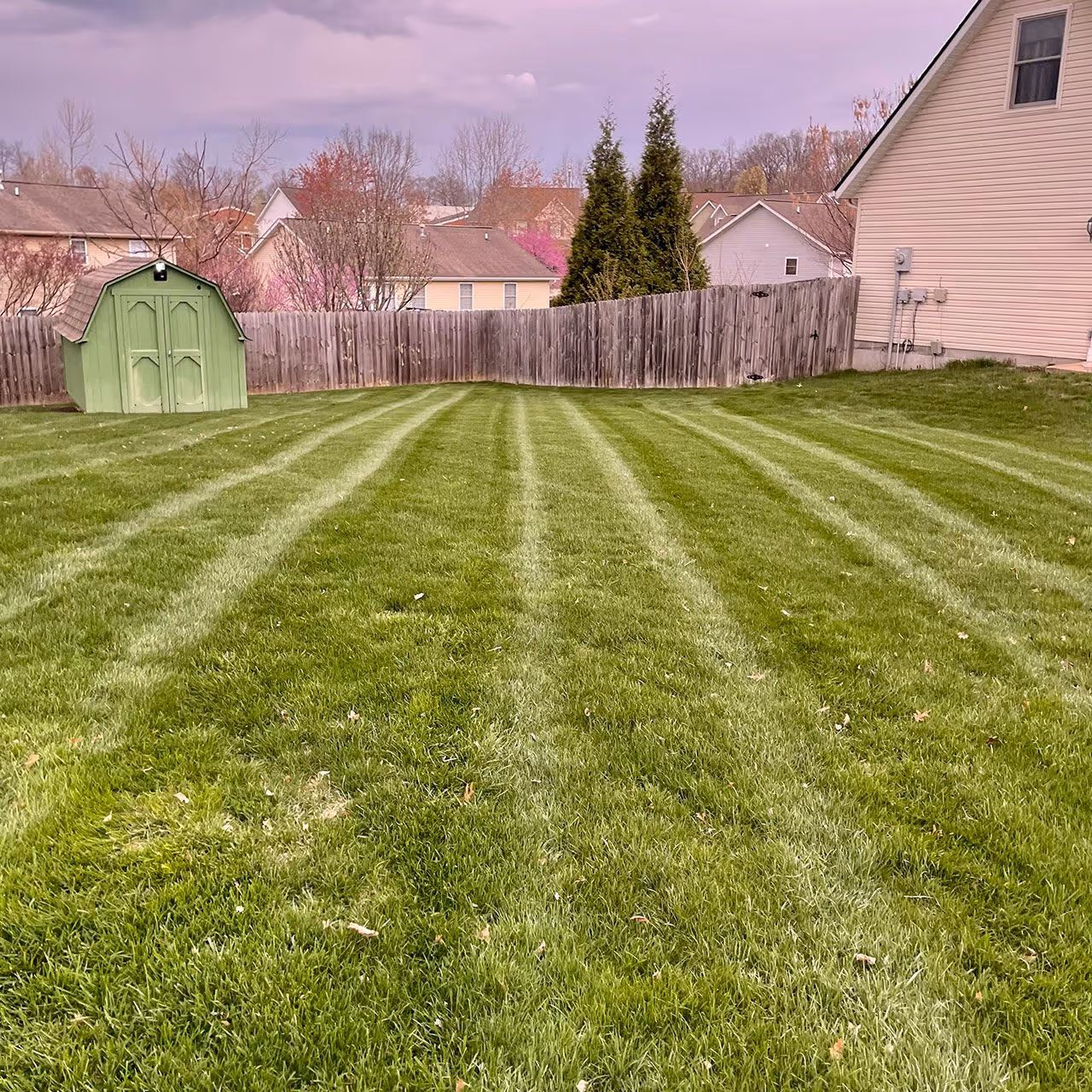 Lawn mowing, trimming, and edging service by Executive Lawn Care & Landscaping in Bloomington, Indiana
