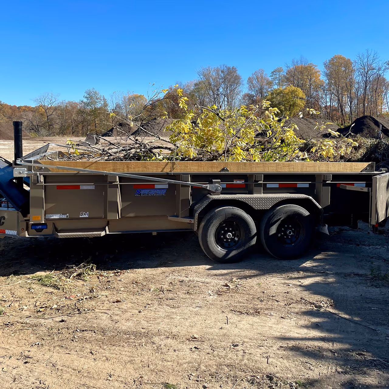 debris removal service by Executive Lawn Care & Landscaping