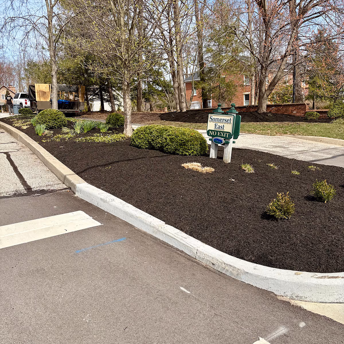Landscape mulch installation and bed edging by Executive Lawn Care & Landscaping in Bloomington, Indiana