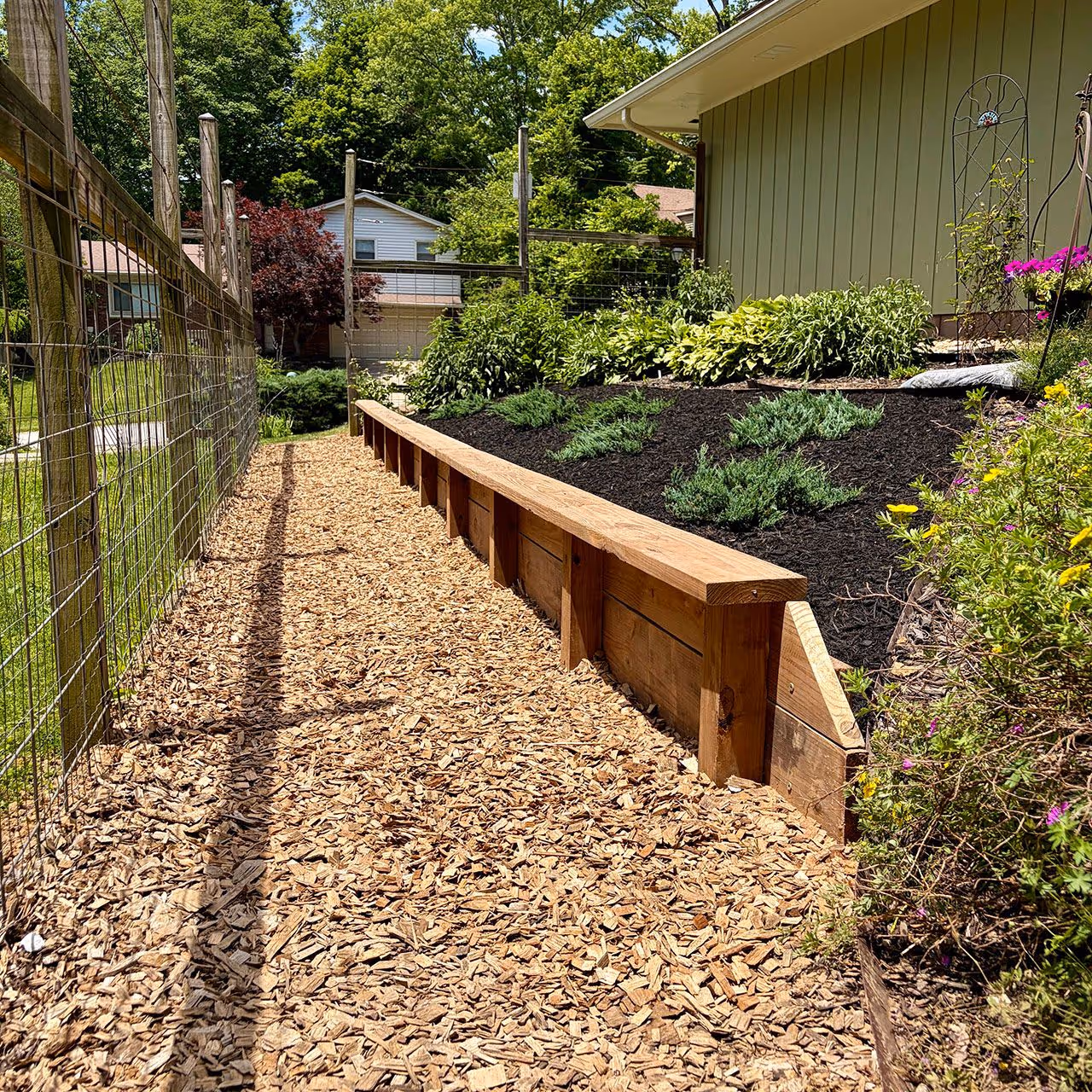Cedar retaining wall construction by Executive Lawn Care & Landscaping in Bloomington, Indiana