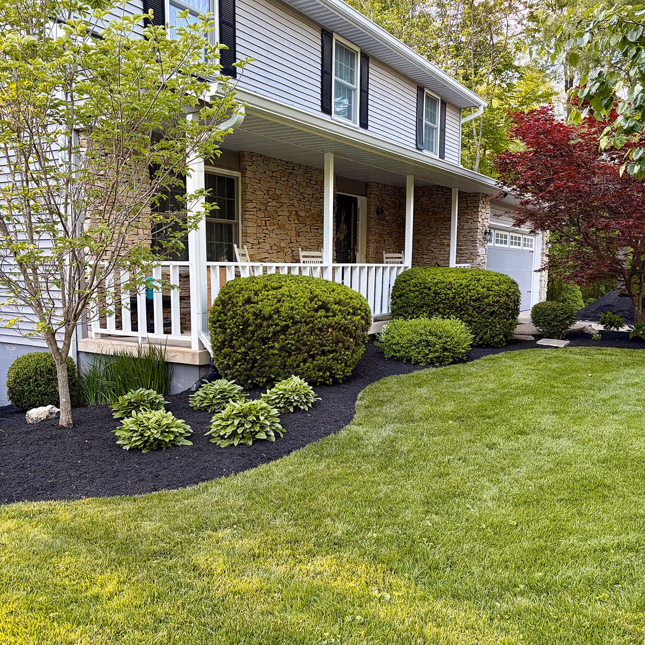 Professional landscaping installation and property enhancement by Executive Lawn Care & Landscaping in Bloomington, Indiana