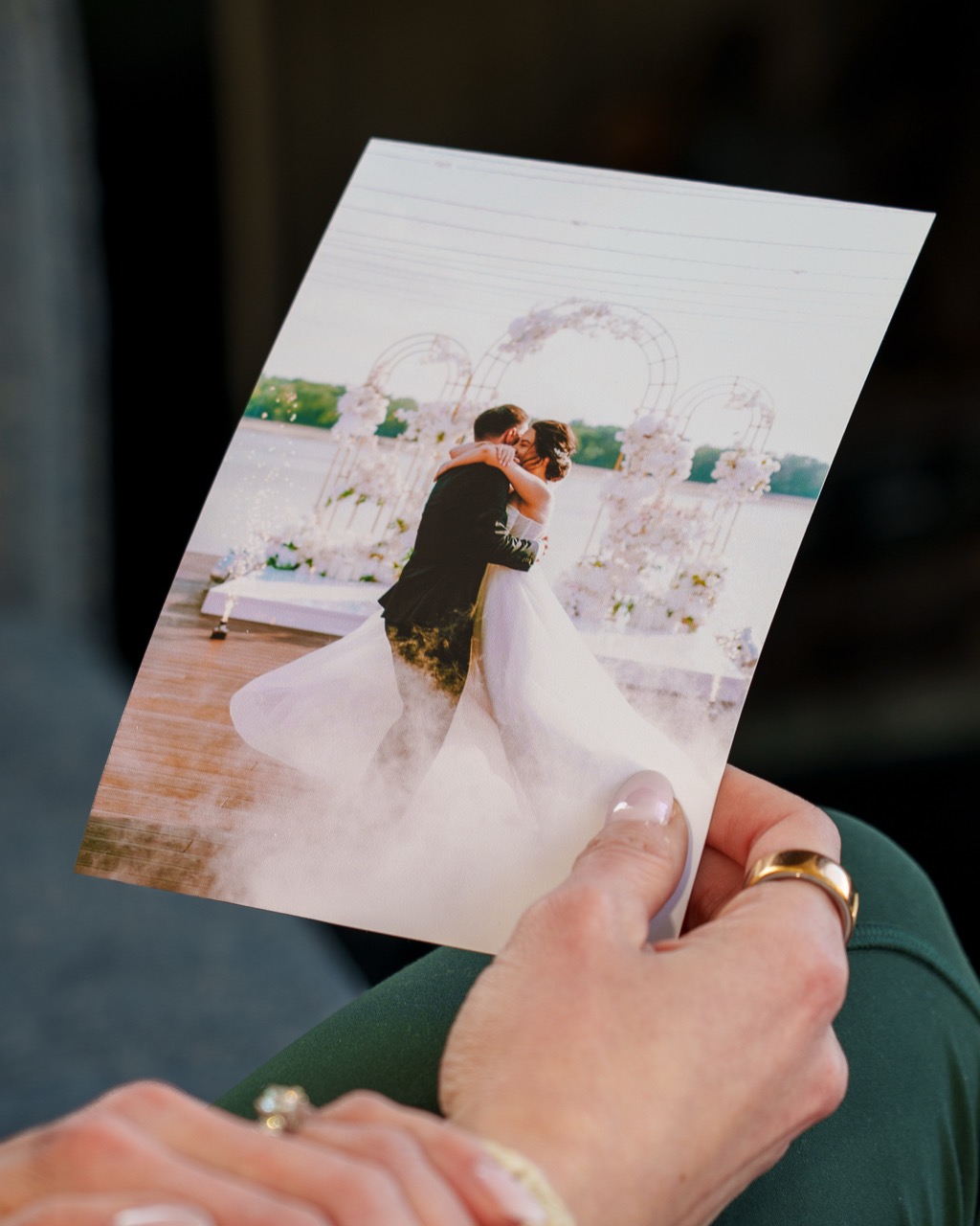 Flat portrait card with a photo front, held by the recipient