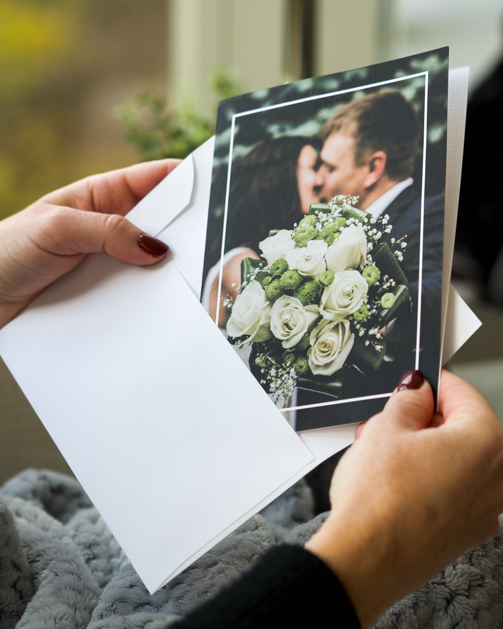 Handwriting sample being written in pen for a folded portrait card font