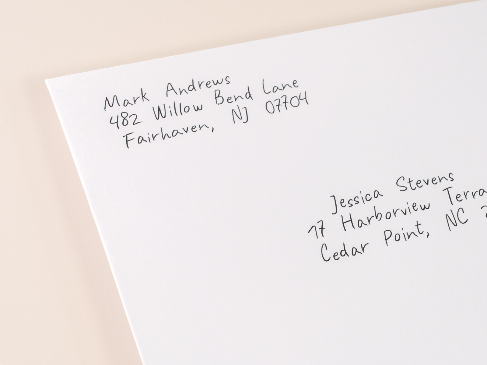 Macro close-up of a hand-addressed envelope written in real pen