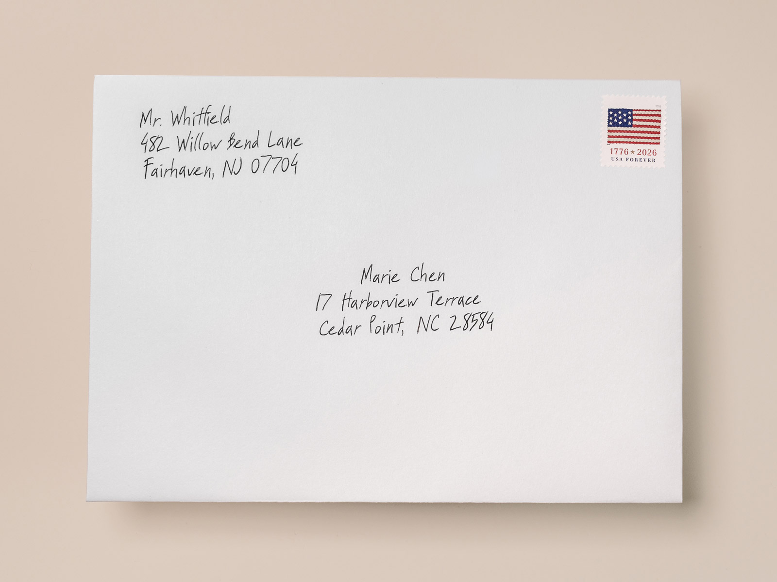 Hand-addressed envelope for a donor thank you card written in real pen