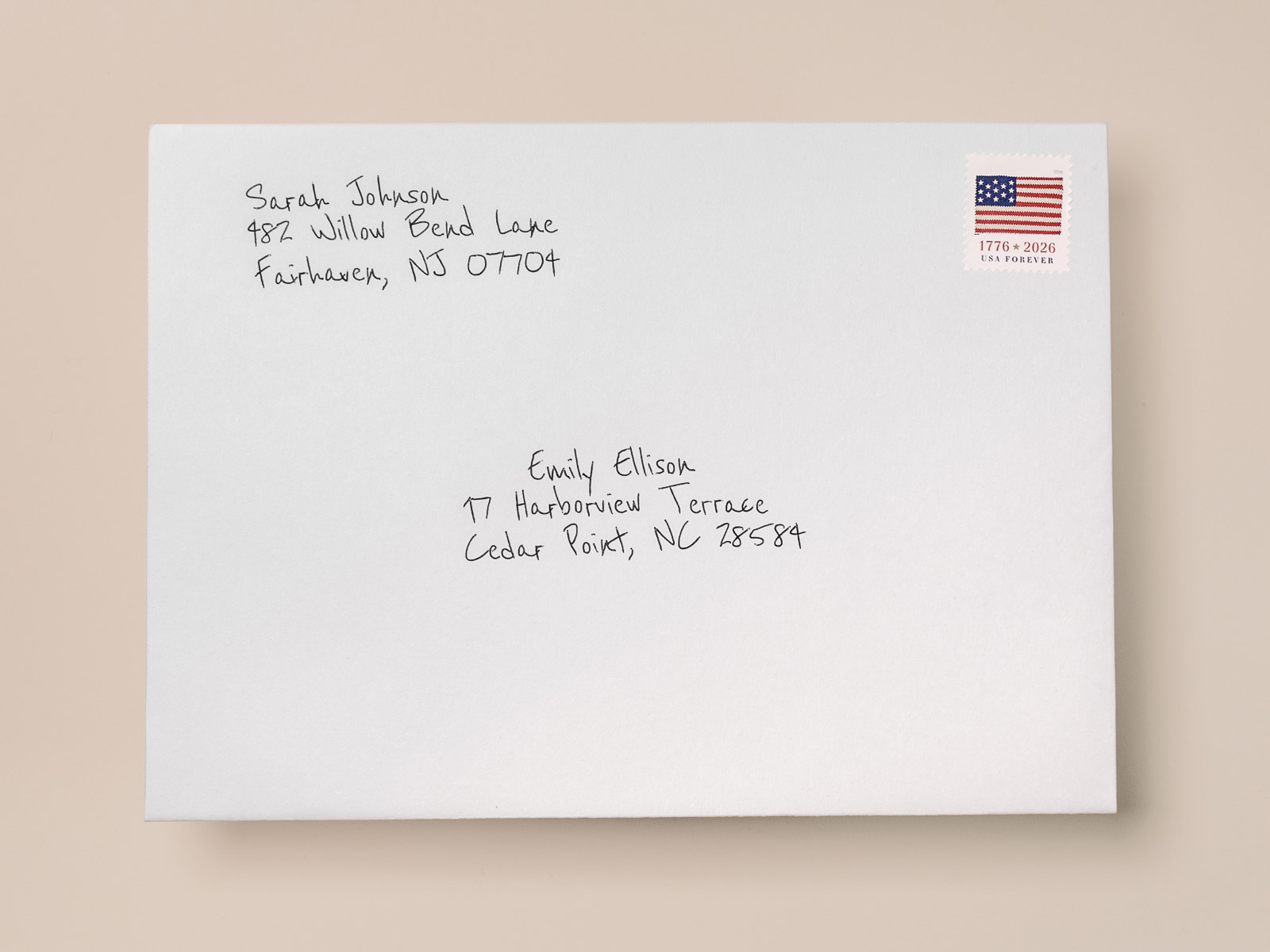 Hand-addressed envelope written in real ballpoint pen