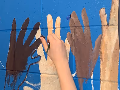 image of volunteers supporting a community garden project