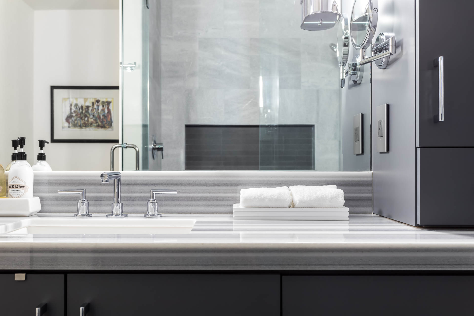 Meadow kitchen with custom range hood and warm finishes