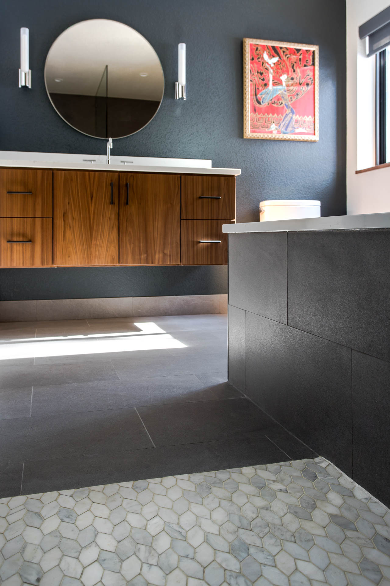 Meadow home with quartzite countertops and mosaic ceramic backsplash