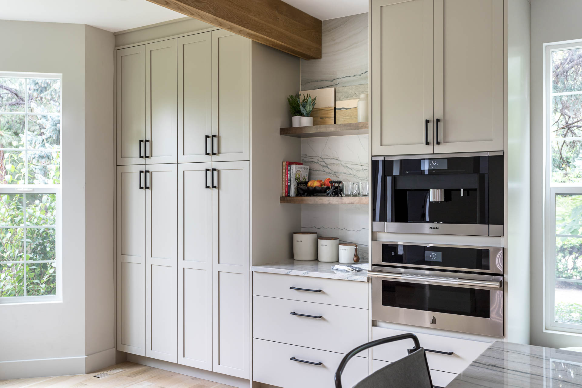 Tennyson home featuring custom cabinetry and white oak floors