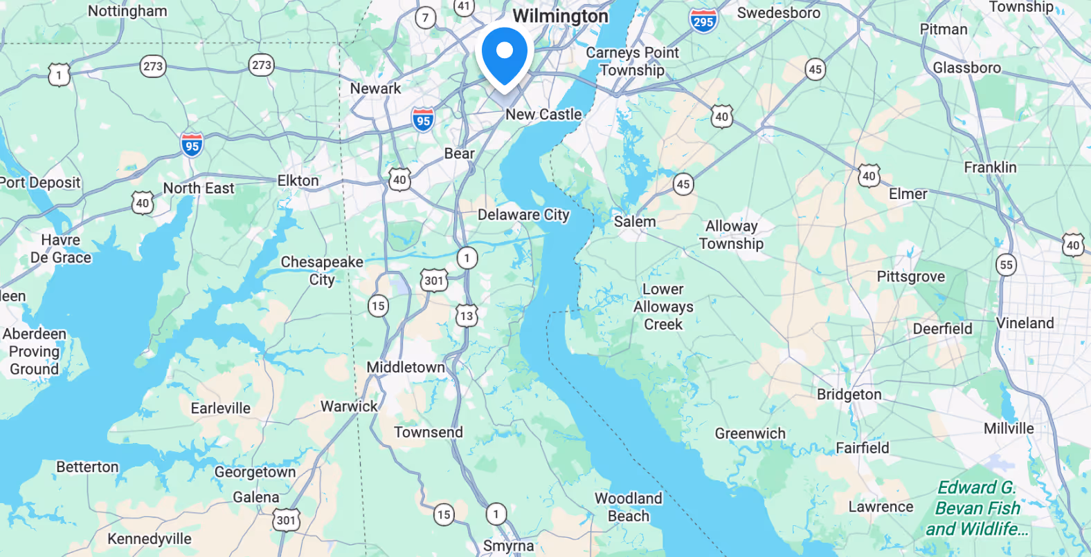 Map showing towns and highways around Delaware River including Newark, Middletown, Smyrna, and Bombay Hook National Wildlife Refuge.