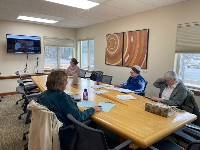 image of a nonprofit group meeting in a board room