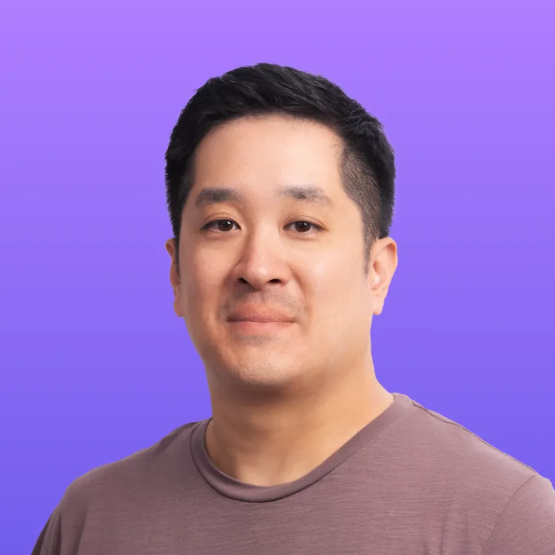 User headshot against purple background