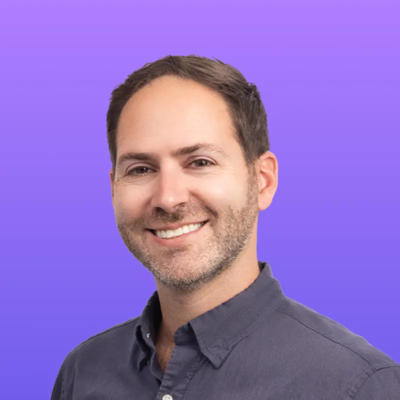 User headshot against purple background