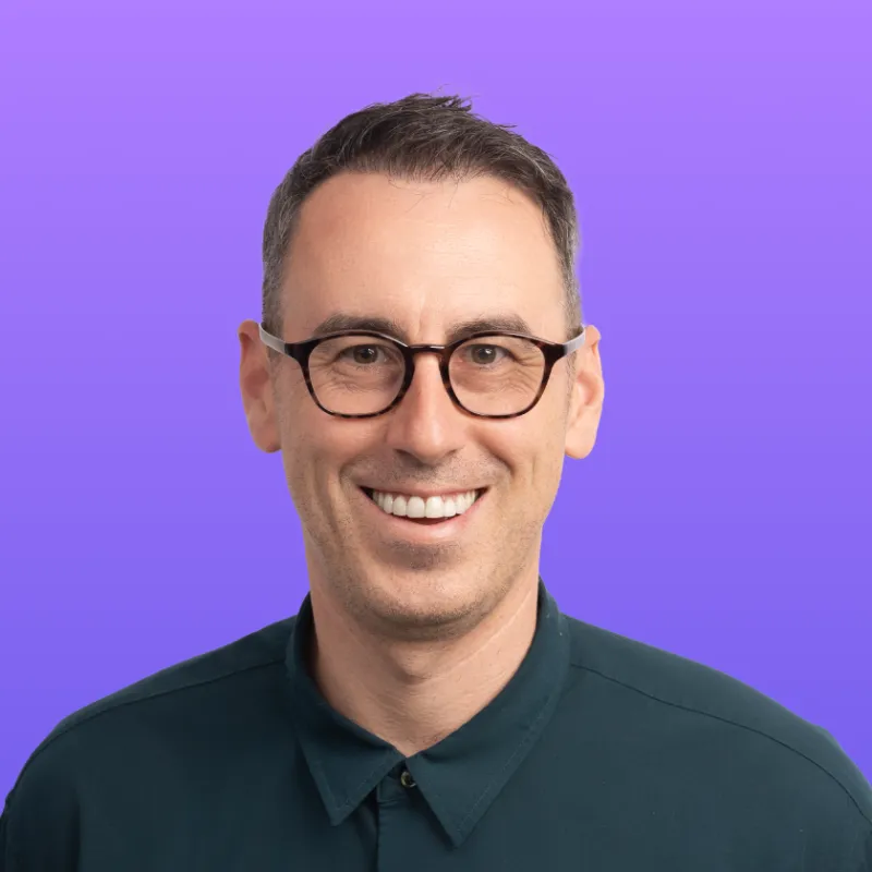 User headshot against purple background