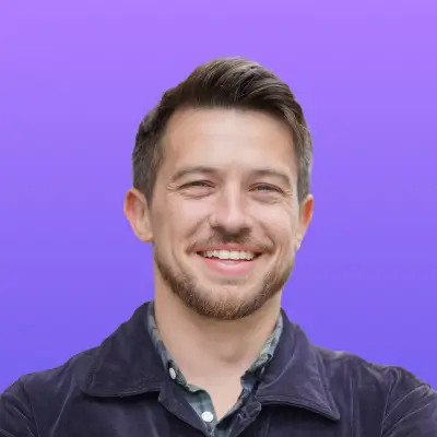 User headshot against purple background