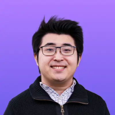 User headshot against purple background