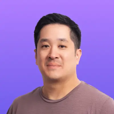 User headshot against purple background
