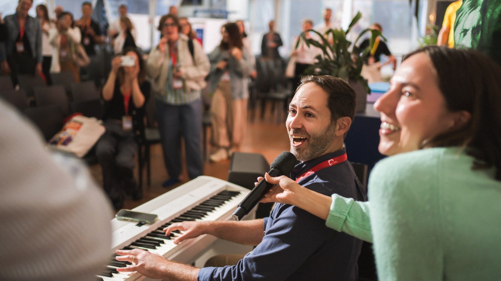 Conference attendees singing along at the Games Industry Law Summit 2026 in Berlin