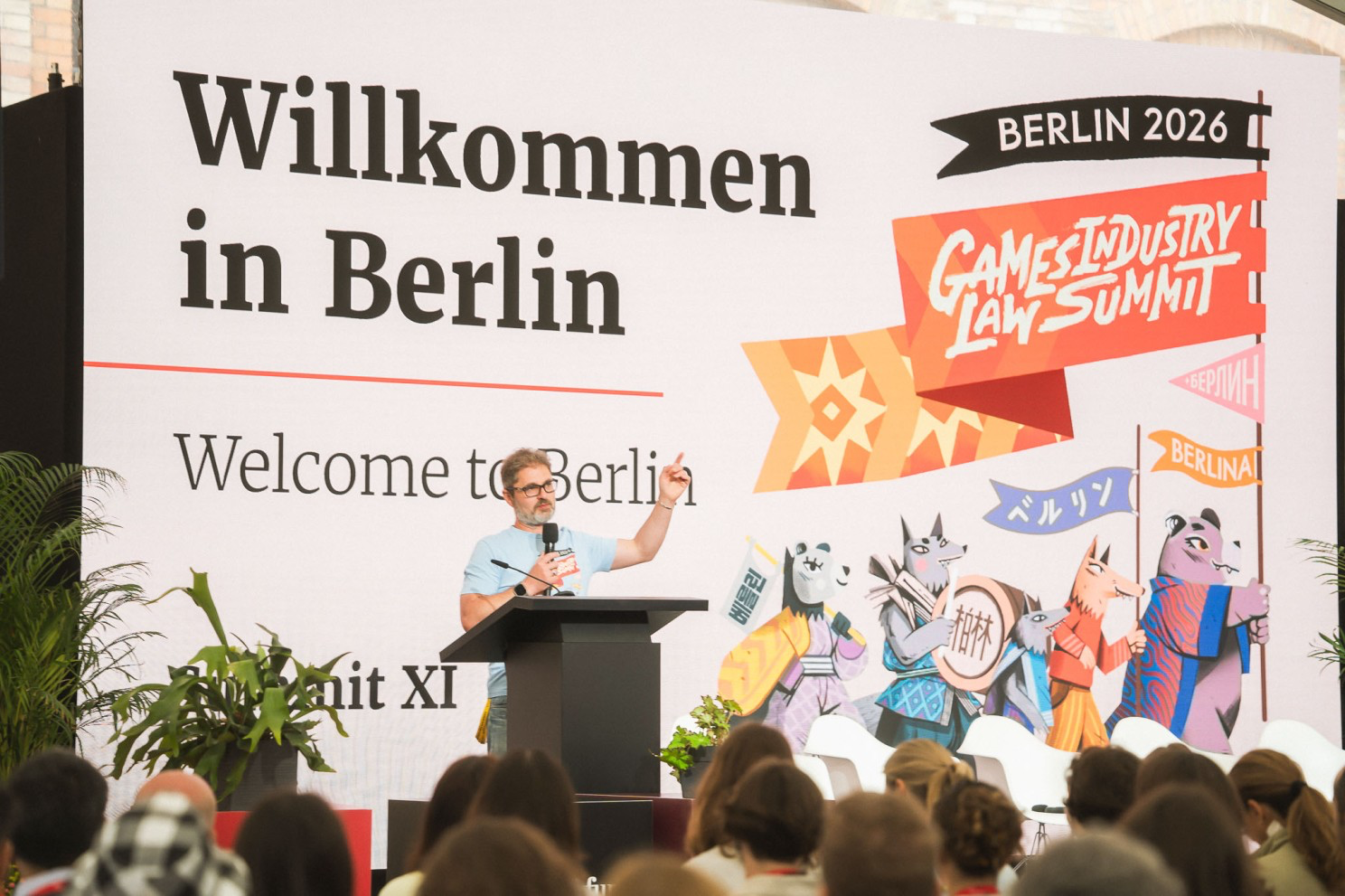 Speaker on stage at the Games Industry Law Summit 2026 in Berlin