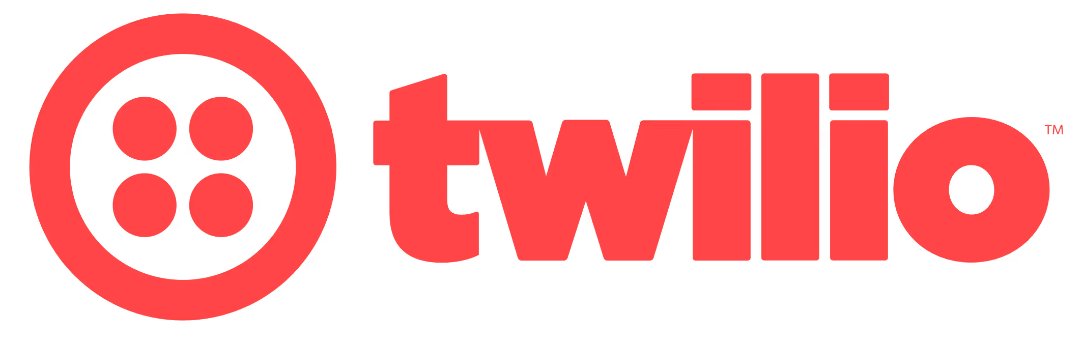 Twilio company logo in red with a circular icon of four dots on the left.