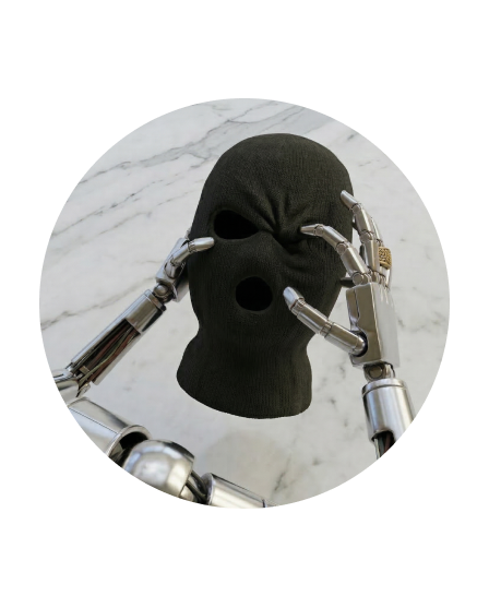Robotic hands holding a black ski mask with cutouts for eyes and mouth against a marble background. Representing AI-powered fraud detection systems 