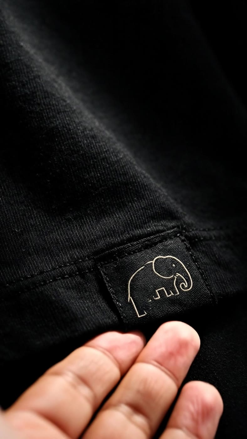 Woven hem label with the elephant, pre-production concept