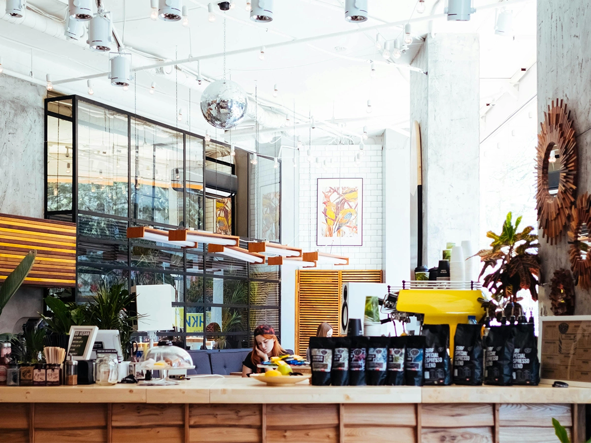 Interior of a coffee shop where people are studying
