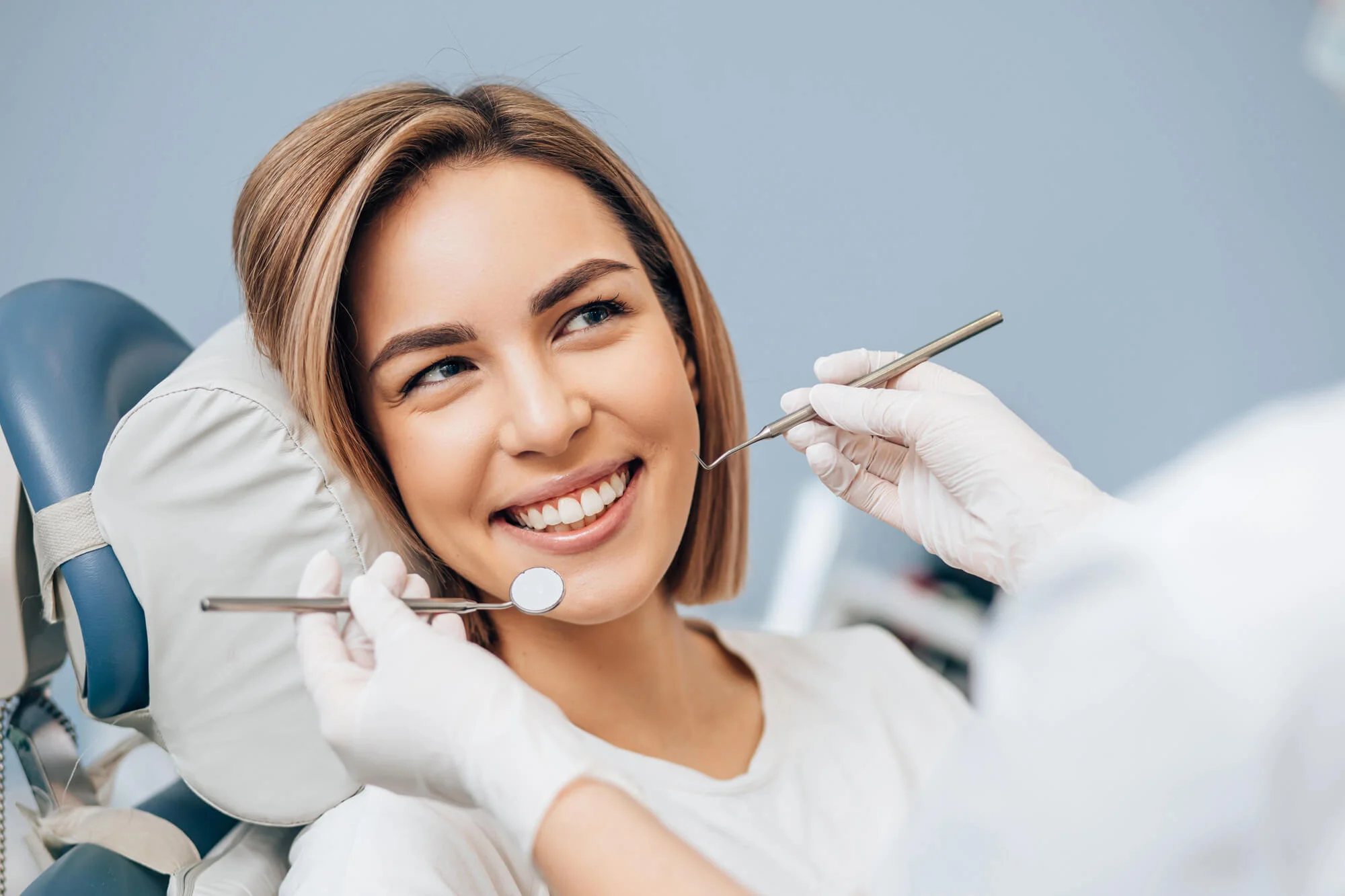 Smiling patient during a routine dental examination
