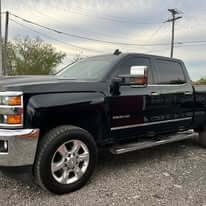 Black pickup truck with window tinting