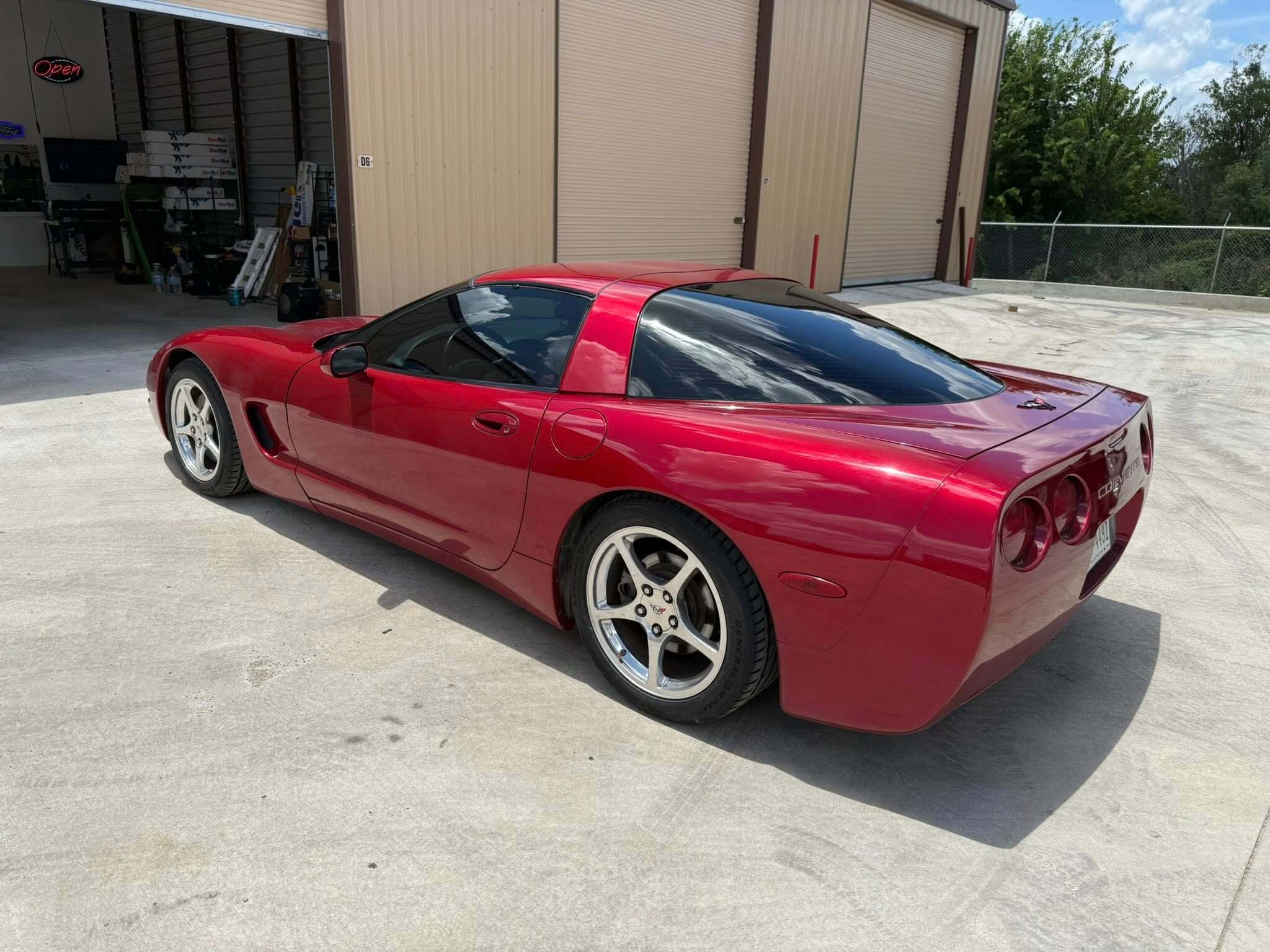 Red corvette with window tinting
