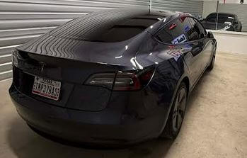 Black sedan with window tinting