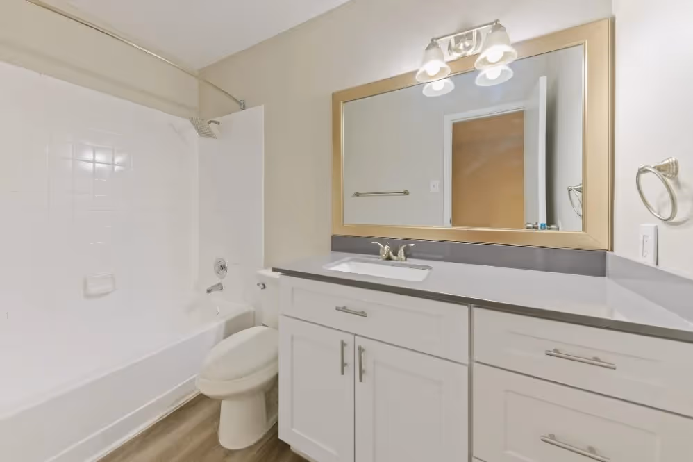 Bathroom with white cabinets