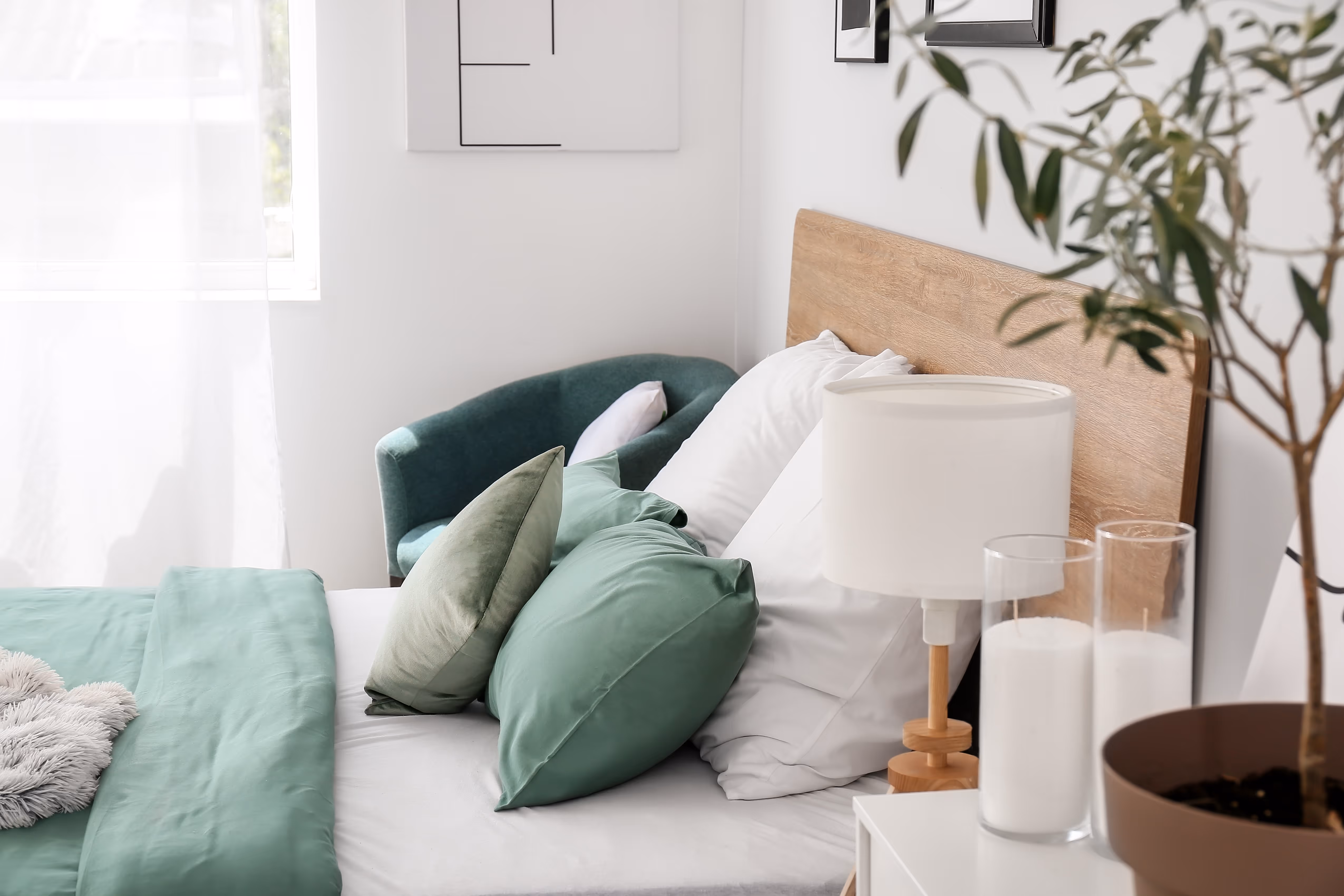 Bedroom with blue pillow stock images