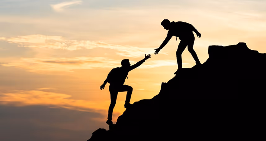 people climbing a mountain