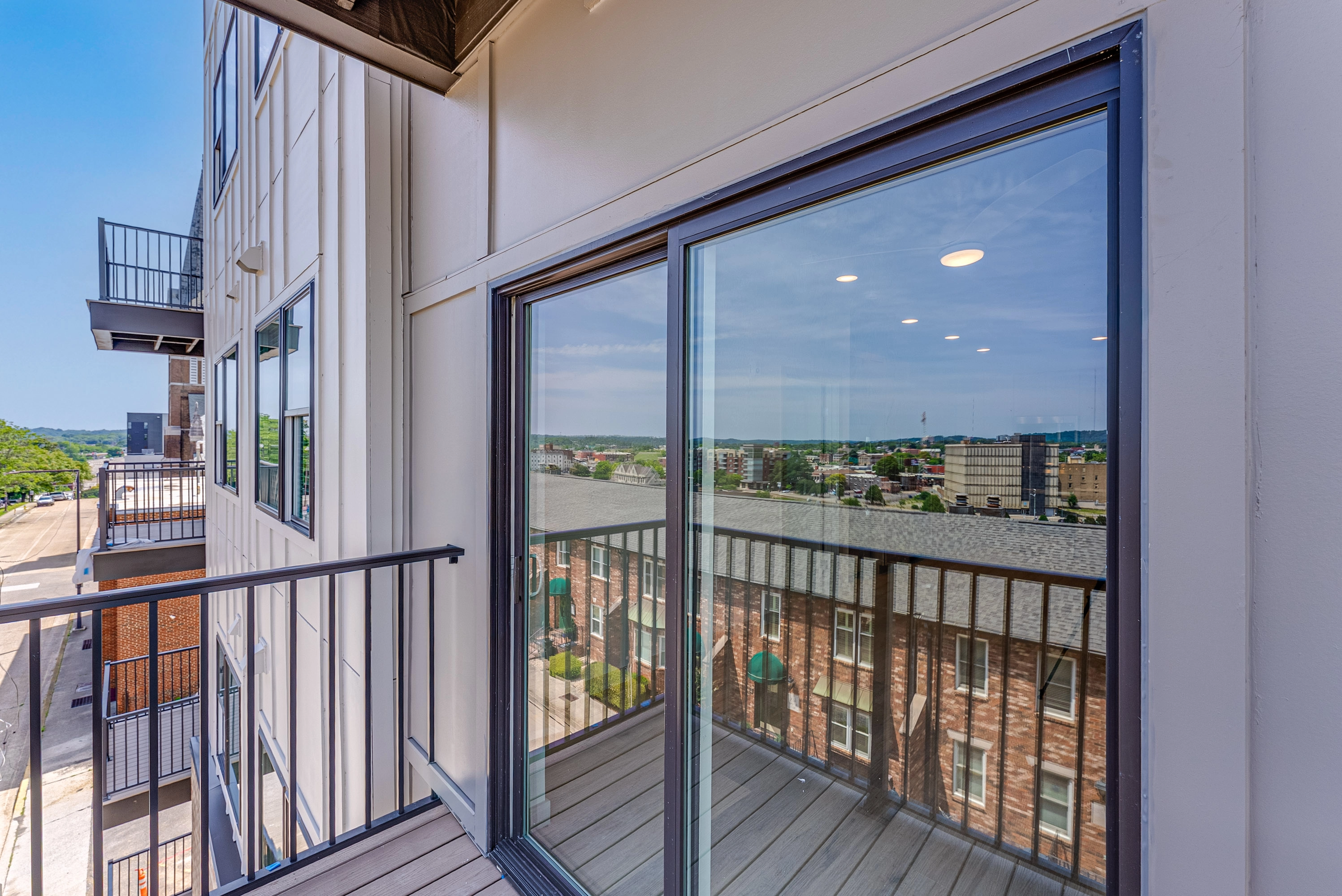 An exterior view of a condo building from the balcony 
