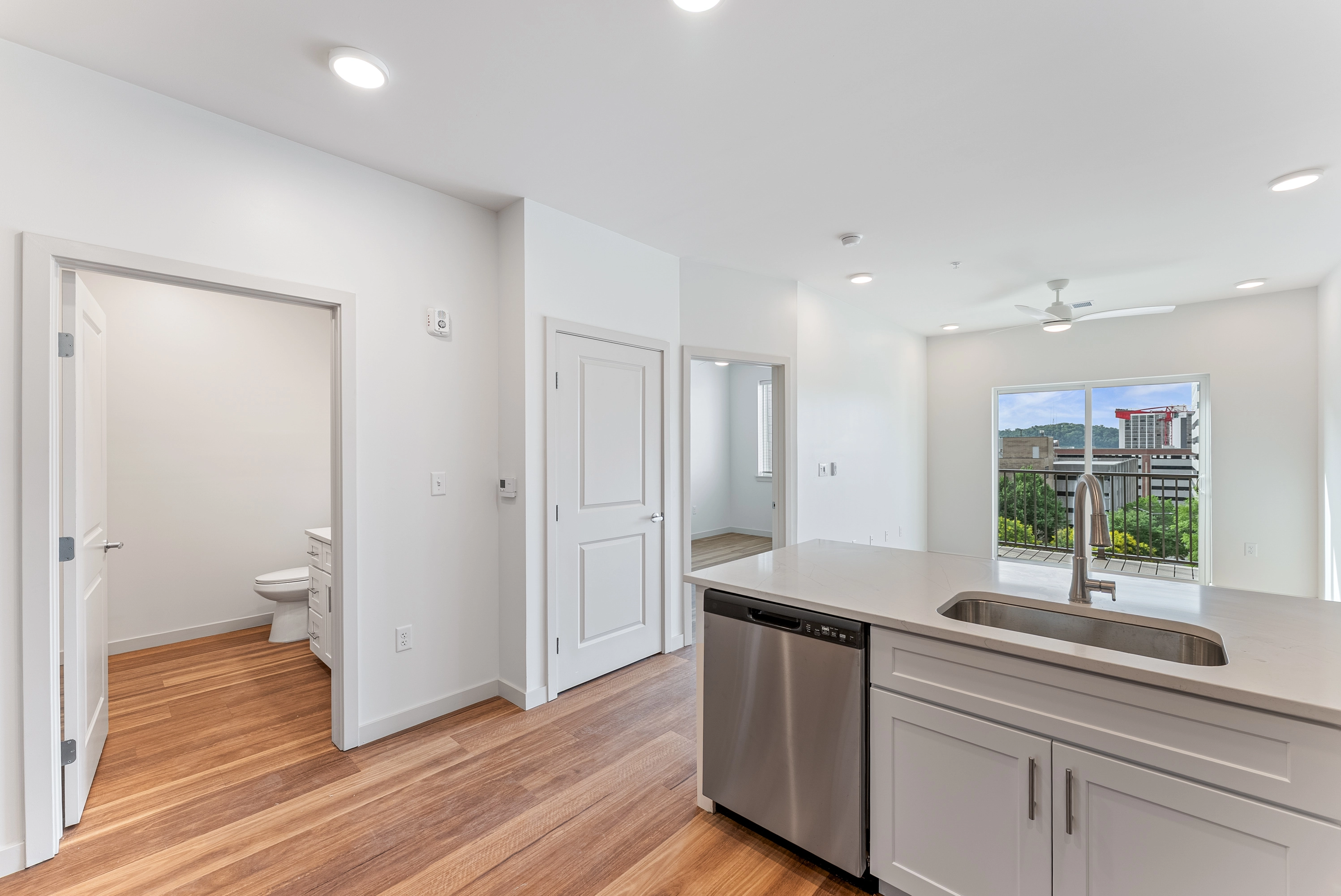 A light and airy, open white bathroom with 