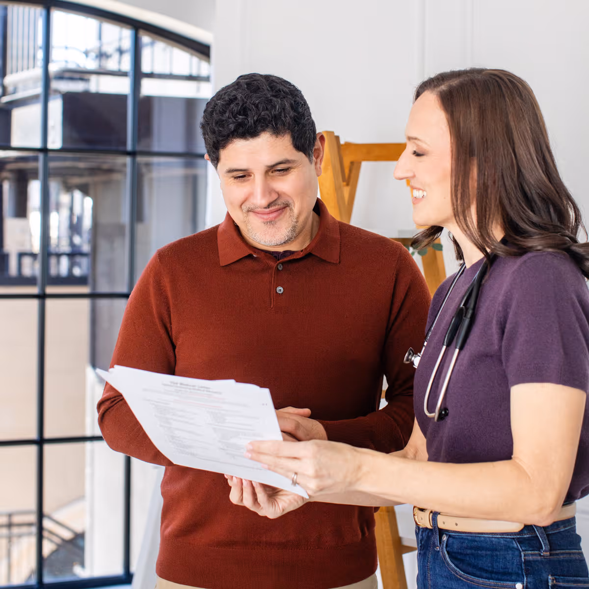 Dr. Sarah French, MD with patient