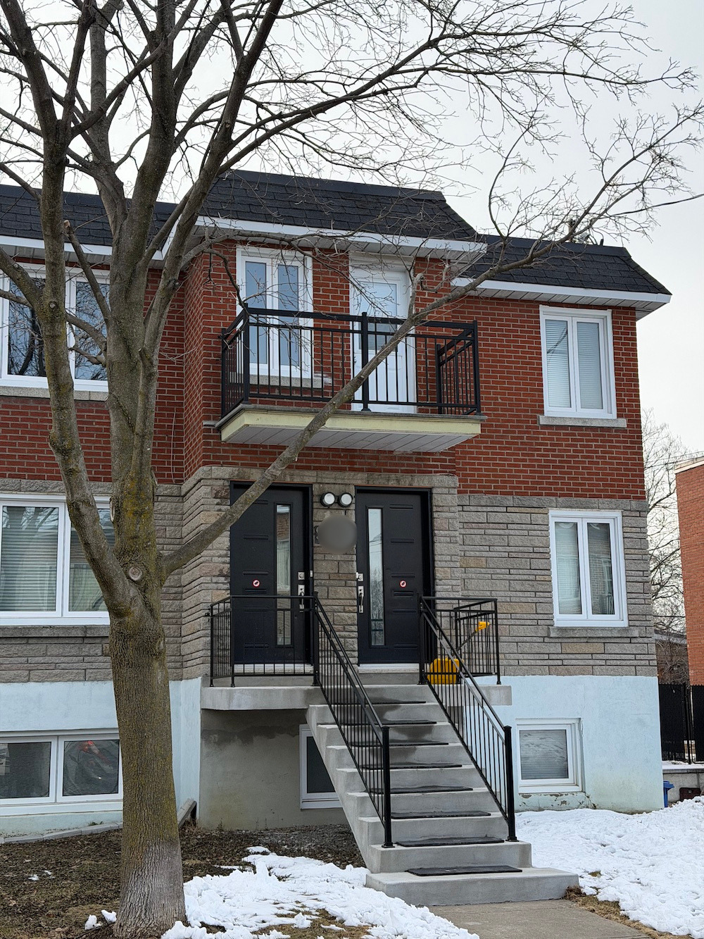 Montreal duplex brick facade exposed to freeze thaw weather conditions
