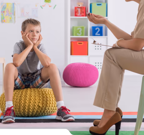 Child working one-to-one with an ABA therapist