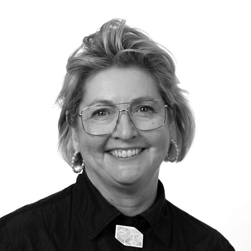 Black & white front headshot of Dr Libby Ward-Christie