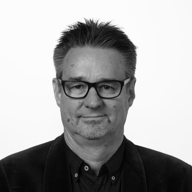 Black & white front headshot of Warren Armstrong 