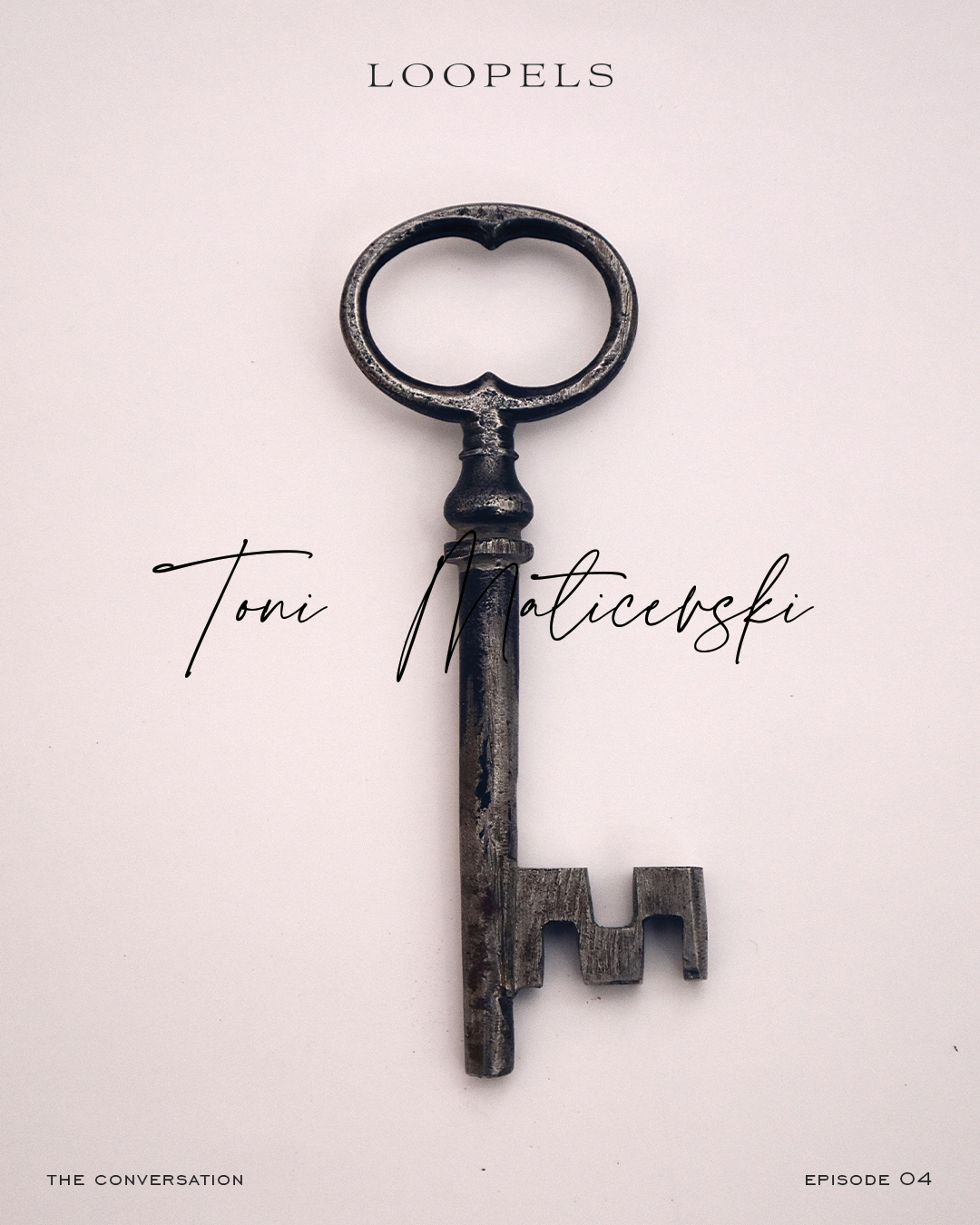 Old antique key on a light background with text overlays including LOOPLES and Toni Maticevski.